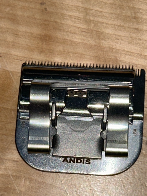 Photo 3 of Andis – 64740, Ultra Edge Detachable Clipper Blade – Infused with Carbon Steel, Extends Edge Life, Deep Cutting of Bulky Hairs with Closed Cutting Technique – 25-Inch Cut Length, Chrome