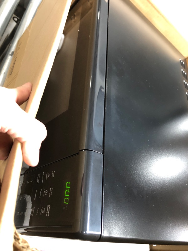 Photo 13 of ***USED - SCRATCHED AND DIRTY - LIKELY MISSING PARTS - UNABLE TO VERIFY FUNCTIONALITY - SEE PICTURES***
BLACK+DECKER EM031MB11 Digital Microwave Oven with Turntable Push-Button Door