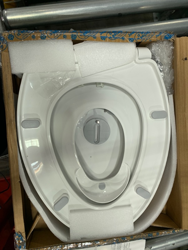 Photo 1 of Quick Flip Elongated Toilet Seat with Built-In Potty & Splash Guard for Toddler Training, Slow Close - Jool Baby