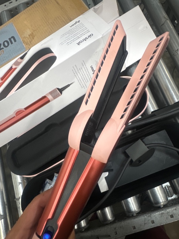 Photo 3 of *POWERS ON**Dyson Special edition Airstrait™ straightener in Strawberry bronze and blush pink