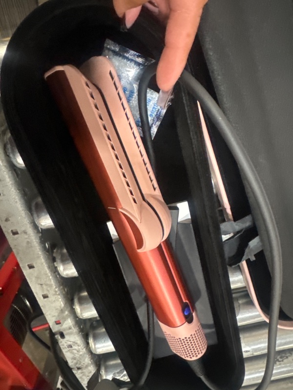 Photo 2 of *POWERS ON**Dyson Special edition Airstrait™ straightener in Strawberry bronze and blush pink