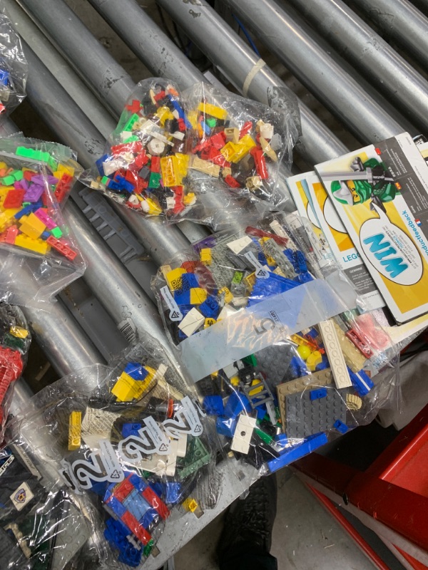 Photo 2 of 8 nBags of sealed legos- unkow n build