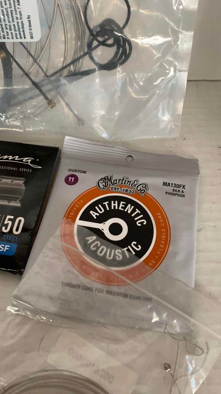 Photo 1 of ASSORTED GUITAR AND BASS STRINGS