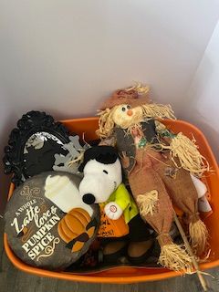 Photo 1 of CONTENTS OF CONTAINER.  HALLOWEEN AND FALL DECOR. SCARECROWS, PUMPKINS, SKELETONS ETC..