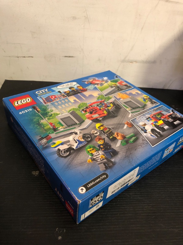 Photo 2 of LEGO City Fire Rescue & Police Chase Building Set 60319 - Kid's Fire & Police Build, Featuring 3 Minifigures, Emergency Truck, Patrol Car, Motorcycle Toys, Gifts for Boys and Girls Age 5+ Years Old***factory sealed