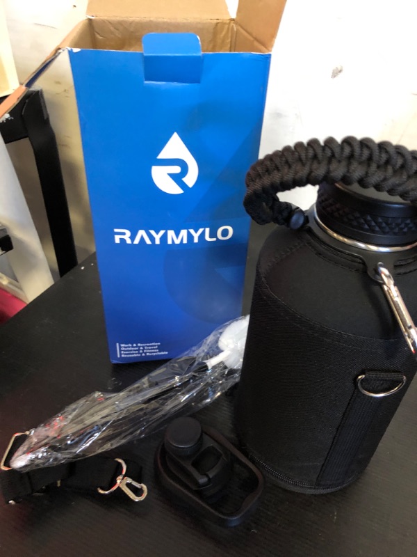 Photo 2 of RAYMYLO Insulated Water Bottle 64 oz, Triple Wall Vacuum Stainless Steel (Cold for 48 Hrs), Leak Proof & Non-BPA, Half Gallon Water Flask Jug with Paracord Handle & Straw Spout Lids, Magic Black