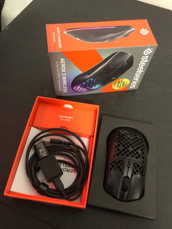 Photo 2 of SteelSeries Aerox 3 Wireless - Holey RGB Gaming Mouse - Ultra-lightweight Water Resistant Design - 18K DPI TrueMove Air Optical Sensor- Onyx