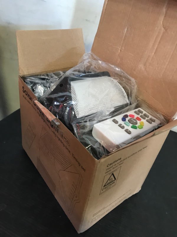 Photo 1 of intelamp Solar Deck Lights with Remote Control, IP65 Waterproofing, Colorful RGB Solar LED Garden and Deck Lights, Atmospheric Solar Powered Fence and Wall Lights