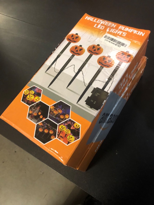 Photo 2 of 10 Pack Halloween Pumpkin Pathway Lights Solar Orange Stake Lights for Halloween Outdoor Decorations Waterproof LED Pumpkin Halloween Lights for Path, Yard, Jack-O-Lantern Yard Stakes Garden Light