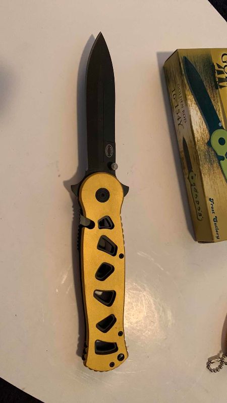 Photo 1 of FROST CUTLERY GOLDEN ROD AND A SMALLER KNIFE