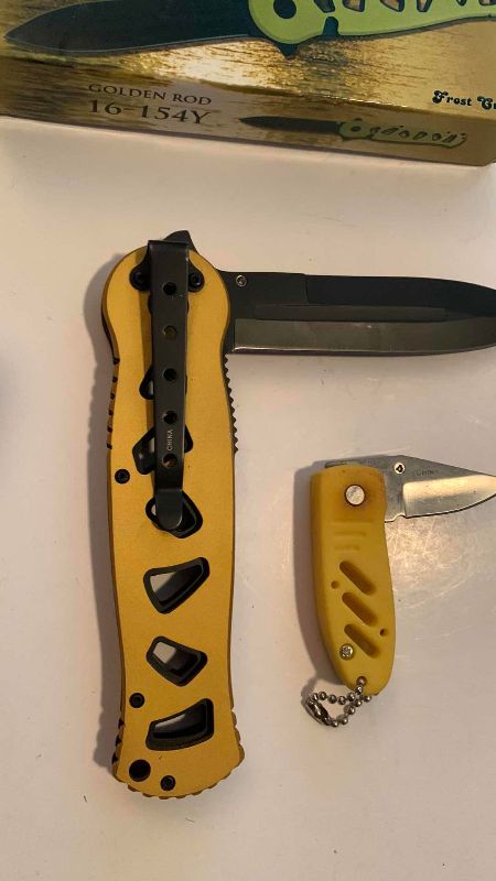 Photo 1 of FROST CUTLERY GOLDEN ROD AND A SMALLER KNIFE