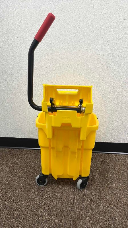 Photo 1 of RUBBERMAID WAVEBREAK MOP BUCKET
