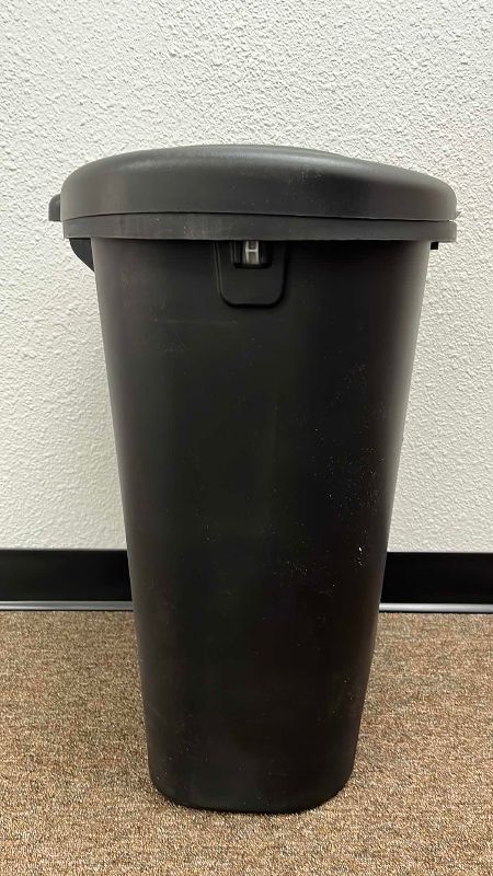 Photo 1 of RUBBERMAID 13 GALLON STEP ON TRASH CAN
