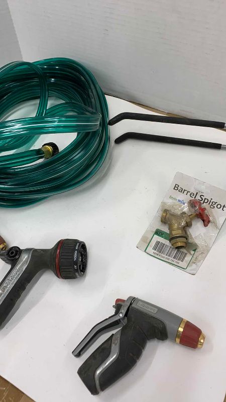 Photo 1 of GARDEN HOSE, HANGER, SPIGOT AND 3-NOZZLES