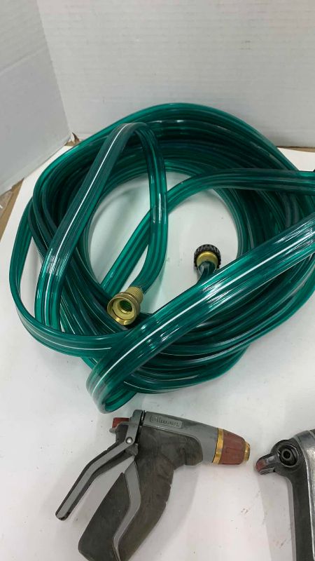 Photo 1 of GARDEN HOSE, HANGER, SPIGOT AND 3-NOZZLES