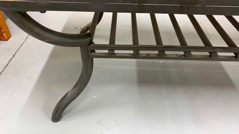 Photo 1 of STONE AND METAL PATIO COFFEE TABLE 49” X 24” H 19”
