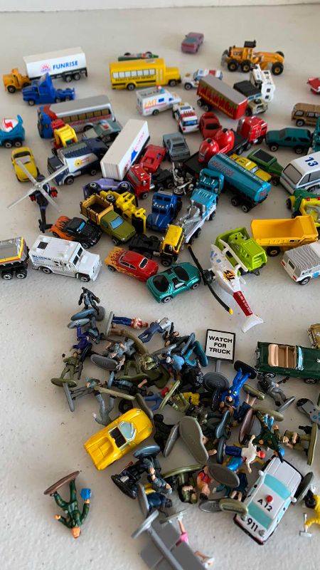 Photo 1 of VINTAGE ASSORTED MINI VEHICLES AND PEOPLE MICRO MACHINES