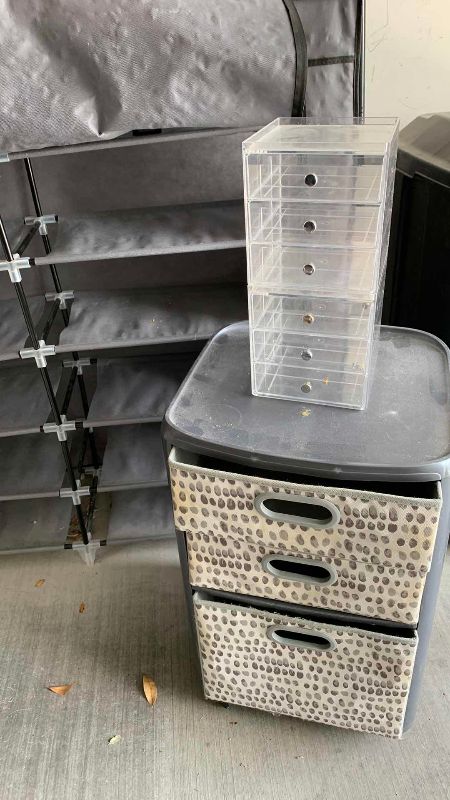 Photo 1 of STORAGE ITEMS AND COVERED SHOE RACK