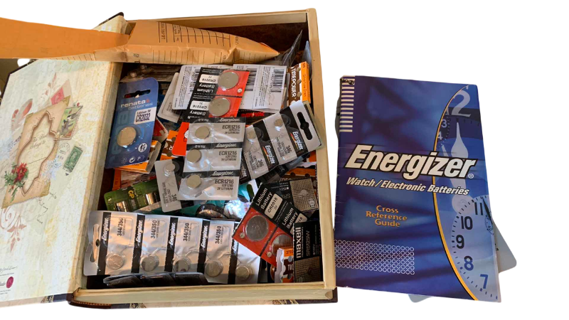Photo 1 of BOX OF ASSORTED WATCH BATTERIES AND ENERGIZER GUIDE