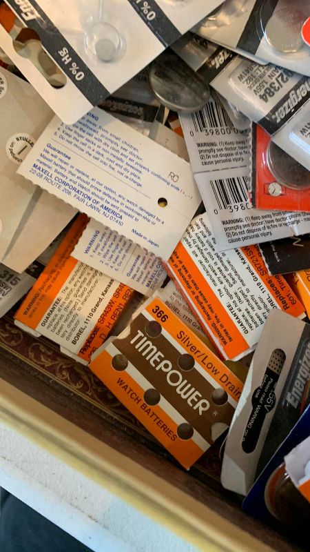 Photo 1 of BOX OF ASSORTED WATCH BATTERIES AND ENERGIZER GUIDE