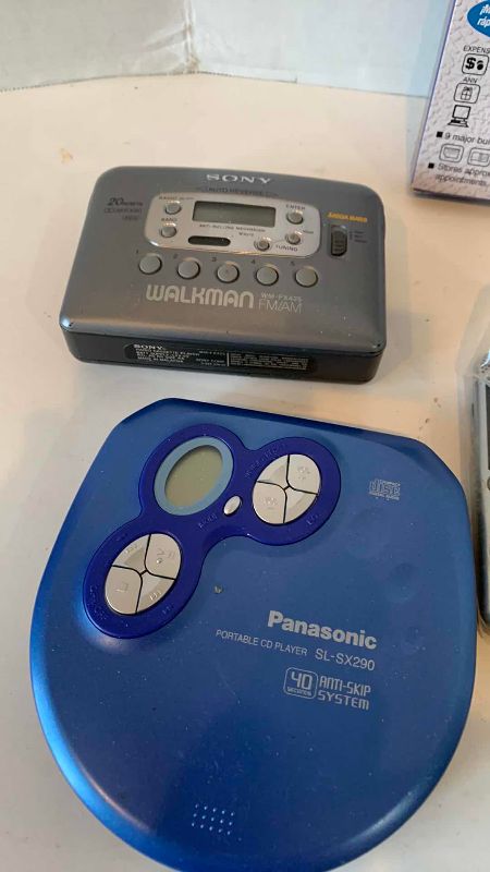 Photo 1 of CD AND CASSETTE PLAYERS, VOICE RECORDER AND A DIGITAL CAMERA
