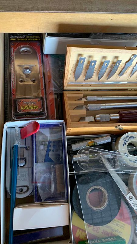 Photo 1 of CONTENTS OF DRAWER