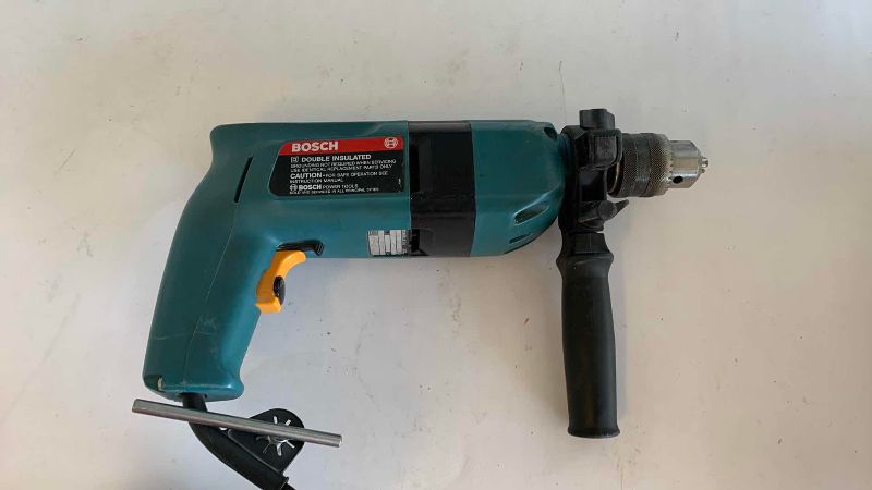 Photo 1 of BOSCH 1198 VSR 1/2” HAMMER DRILL