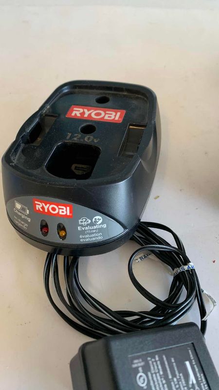 Photo 1 of RYOBI 3/8” DRILL MOTOR CHARGER AND BATTERY