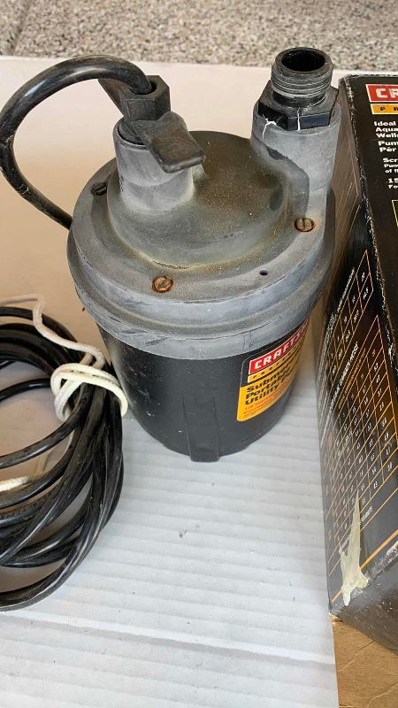 Photo 1 of CRAFTSMAN 1/4 HP SUBMERSIBLE UTILITY PUMP AND A BIRD BATH