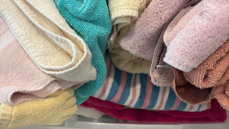 Photo 1 of BIN OF ASSORTED BATH TOWELS