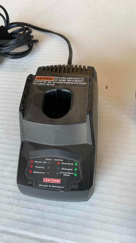 Photo 1 of CRAFTSMAN TOOL BATTERIES CHARGER AND 2-19.2VOLT BATTERIES