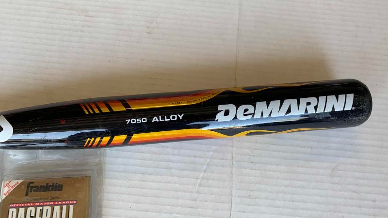 Photo 1 of DEMARINI NITRO SOFTBALL BAT AND 2-BATTING GLOVES