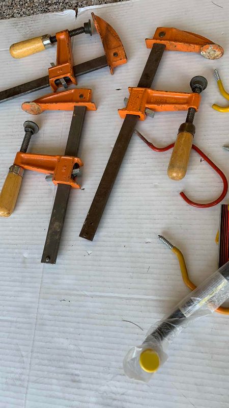 Photo 1 of CLAMPS AND WALL HOOKS