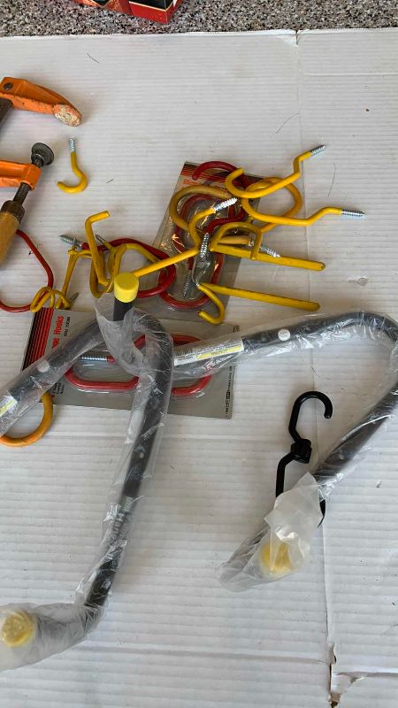 Photo 1 of CLAMPS AND WALL HOOKS