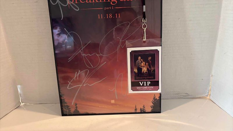 Photo 1 of AUTOGRAPHED BREAKING DAWN PART 1 CAST MOVIE ADVERTISEMENT 11.5" X 17" AND VIP BADGE