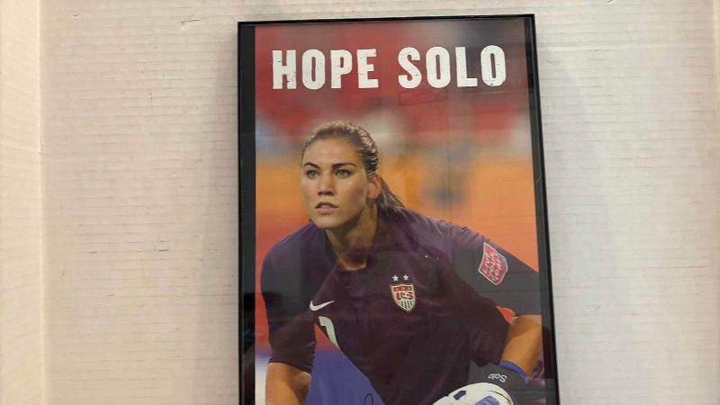 Photo 1 of AUTOGRAPHED UNITED STATES WOMEN'S SOCCER TEAM HOPE SOLO PICTURE