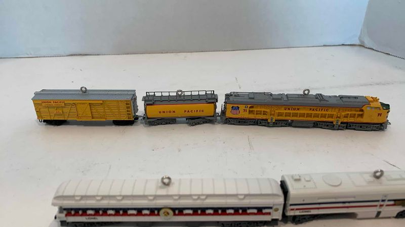 Photo 1 of MINIATURE LIONEL TRAIN SETS