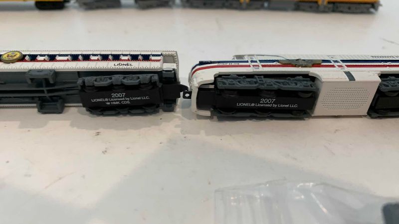 Photo 1 of MINIATURE LIONEL TRAIN SETS