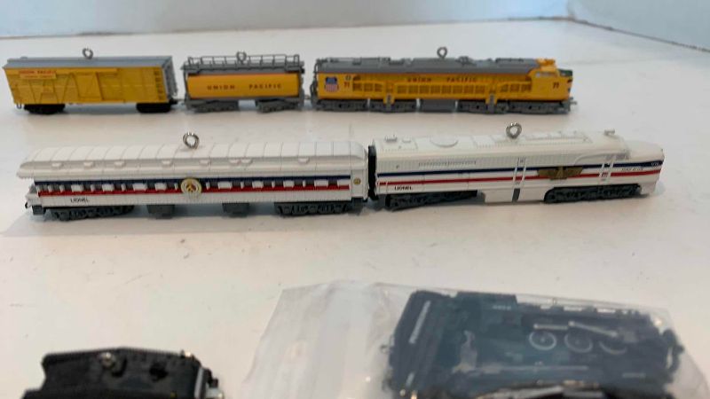 Photo 1 of MINIATURE LIONEL TRAIN SETS