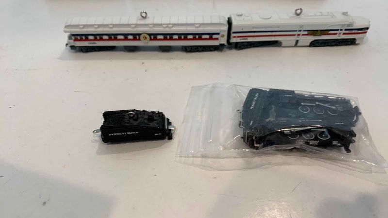 Photo 1 of MINIATURE LIONEL TRAIN SETS