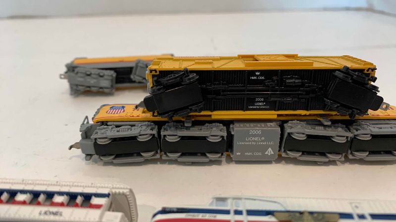 Photo 1 of MINIATURE LIONEL TRAIN SETS