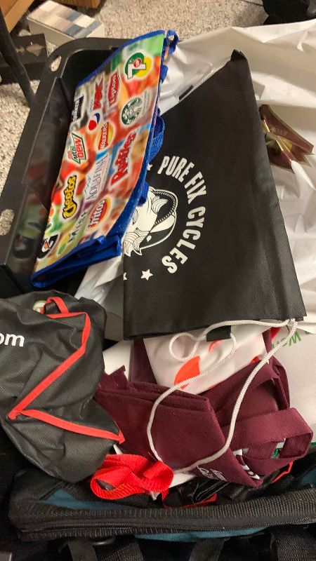Photo 1 of TOTE OF BACKPACKS AND BAGS
