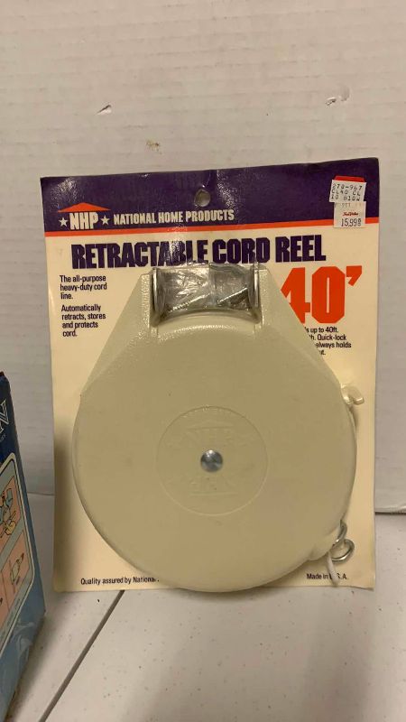 Photo 1 of LIGHT SOCKET FAN AND 40' RETRACTABLE CORD REEL