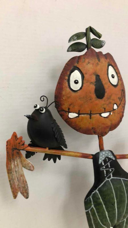 Photo 1 of HALLOWEEN PUMPKIN SCARECROW FIGURE 25”