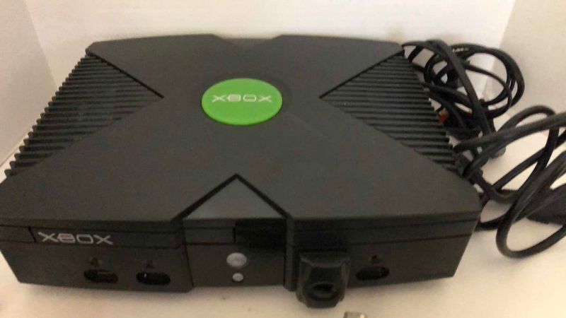Photo 1 of XBOX GAME SYSTEM, DVD CONTROLLER AND 2 HAND CONTROLLERS