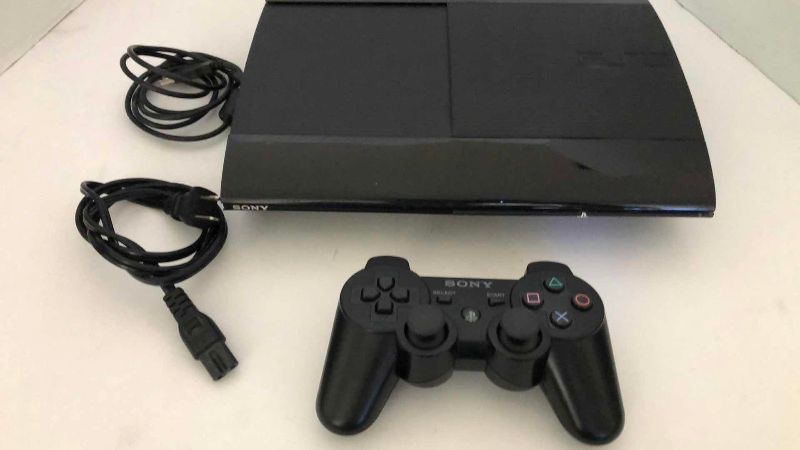 Photo 1 of SONY PLAYSTATION 3 VIDEO GAME SYSTEM WITH A CONTROLLER