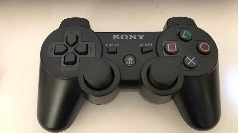 Photo 1 of SONY PLAYSTATION 3 VIDEO GAME SYSTEM WITH A CONTROLLER