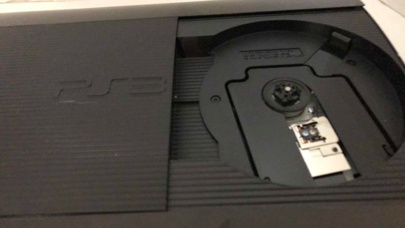 Photo 1 of SONY PLAYSTATION 3 VIDEO GAME SYSTEM WITH A CONTROLLER