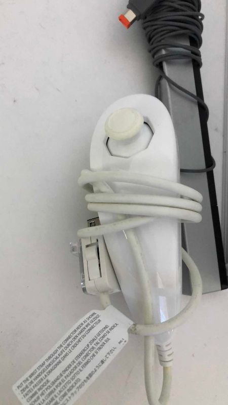 Photo 1 of NINTENDO WII VIDEO GAME SYSTEM WITH A CONTROLLER