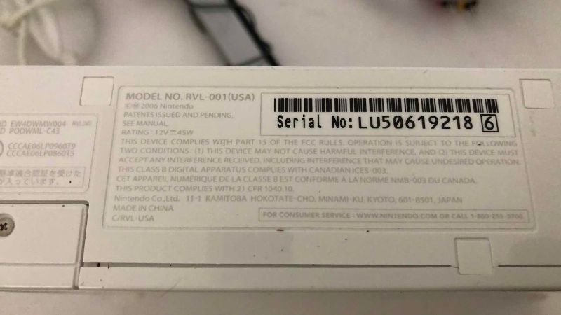 Photo 1 of NINTENDO WII VIDEO GAME SYSTEM WITH A CONTROLLER